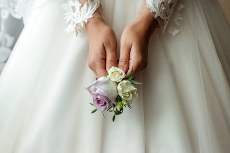Wedding series 25. Wedding bouquet from colorful roses in hand of the bride