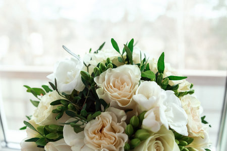 Wedding bouquet on the window. The concept of marriage, family relationships, wedding paraphernalia