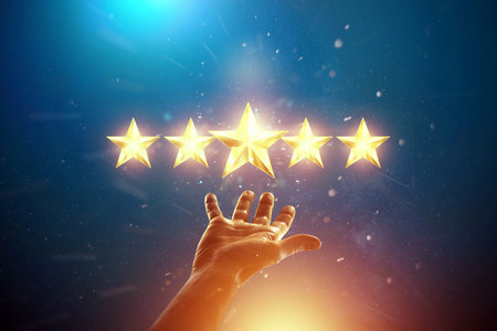 Close-up of a hand and 5 stars, assignment of a new rating, evaluation of services, a new level,...