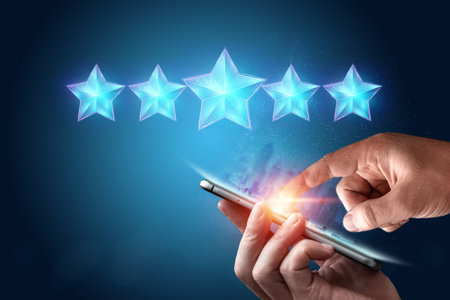 Close-up of hands and smartphone put 5 stars, assignment of a new rating, evaluation of services,...