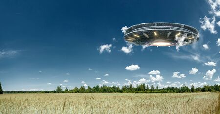 UFO, an alien plate hovering over the field, hovering motionless in the air. Unidentified flying object, alien invasion, extraterrestrial life, space travel, humanoid spaceship mixed mediumの写真素材