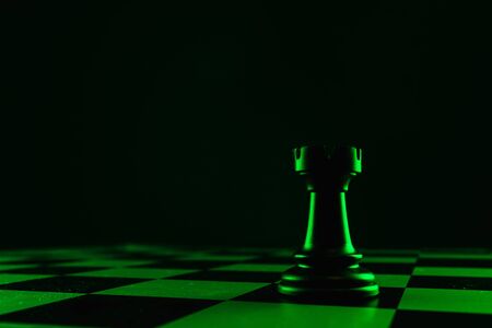 Chess pieces, rook on a chessboard, game. The concept of confrontation, career, competition, startup, battle of brainsの写真素材