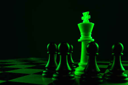 Close-up hand makes a pawn move, chess, chessboard, game, confrontationの写真素材