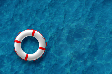 Orange Lifebuoy on the water. The concept of help, rescue, drowning, storm. Copy space. 3D...