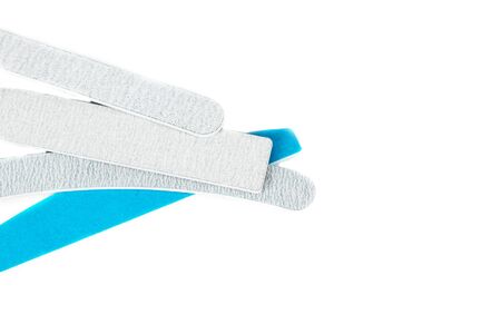Nail files isolated on white background. The concept of manicure, body care. Creative background, copy spaceの写真素材
