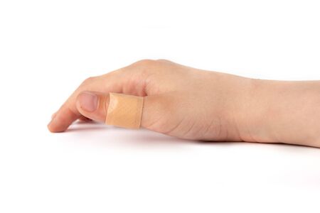Adhesive plaster isolated on white background. Healing wounds, scratches, sadinの写真素材