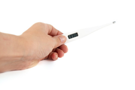 Medical digital thermometer isolated on the white background.The concept of treatment of patients....