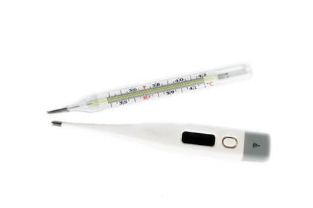 Medical digital thermometer isolated on the white background.The concept of treatment of patients....