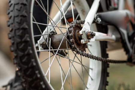 Wheel with a tread with a chain closeup. Bike, cardio workoutの写真素材