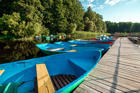 Wooden rowboats at the pierの写真素材
