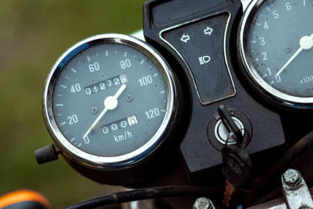 motorcycle speedometer close-up, biker riding on the roadの写真素材