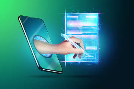 Concept of electronic signature, business at a distance, Image of a phone and a hologram of a contract and a hand with a pen for signature. Remote collaboration, online business. Mixed mediaの写真素材
