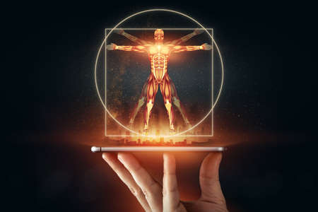 Hologram Vitruvian man, the structure of human muscles, biology of the muscular system. Human anotomy concept.の写真素材