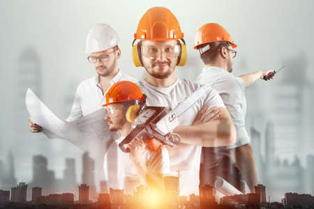 Male architect, builder, handyman on a light background. The concept of construction, architecture, design, business. Mixed environment, double exposureの写真素材