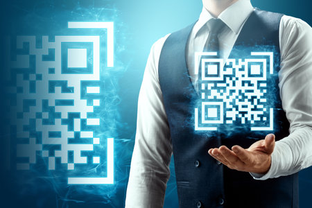 Businessman reads a QR code with a smartphone, new technologies. Electronic digital technology barcode scanningの写真素材