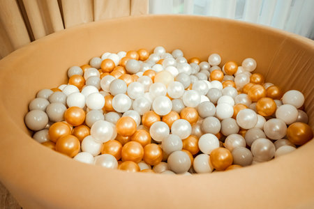 Dry children's pool with balls in the children's roomの写真素材