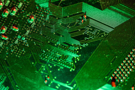 Computer red-green electronic microcircuit, motherboard, tracks. Computer security, technology...