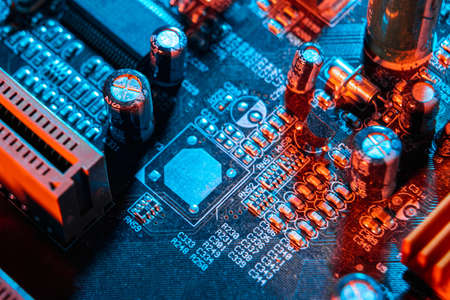Electronic components on a printed circuit board. Resistor, inductor and capacitor on PCB. Concept Electrical engineering, microprocessor, technology. Selective focusの写真素材