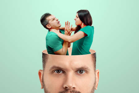 Radical feminism, close-up of a man's head inside a woman strangling a man. The concept of modern society, the fight for women provo, radicolism. Creative backgroundの写真素材