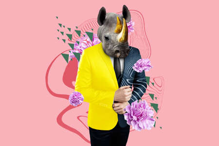 Modern design, A body in a business multi-colored suit with a rhinoceros head, personality, character. Bright trendy colors, shocking art, style for a magazine, fashionable web design. copy the spaceの写真素材