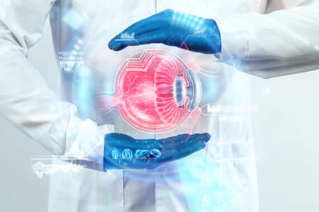 Realistic human eye hologram, doctor checks eyesight. Vision concept, laser eye surgery, catheract, ostegmatism, modern ophthalmologistの写真素材