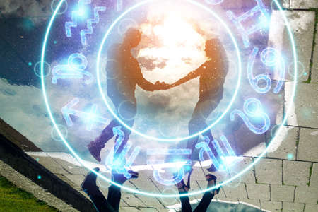 Horoscope concept, couple guy and girl on the background of a circle with the signs of the zodiac, astrology. Conceptual photo of a couple with perfect match between the signs of the zodiacの写真素材