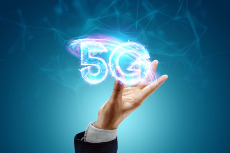 Over hand of businessman 5G hologram, creative background. 5G network concept, high speed mobile...