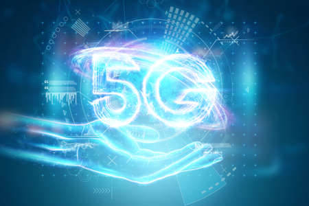 Over hand of businessman 5G hologram, creative background. 5G network concept, high speed mobile internet, new generation networks. Mixed media. 3d render, 3d illustration.の写真素材