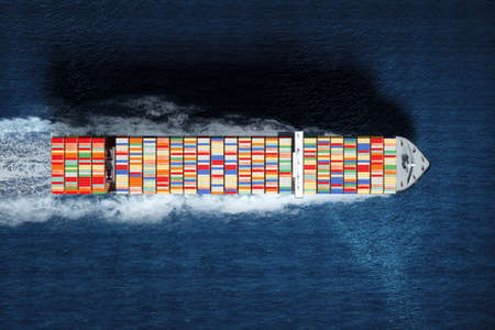 International cargo transportation in containers by sea. Sea huge ship with containers in the sea. mixed media. The concept of transport, logistics, delivery, business, globalizationの写真素材