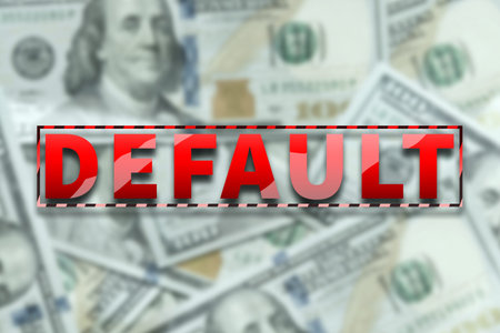 The inscription default in red on the background of dollars. Income reduction, Economic crisis,...