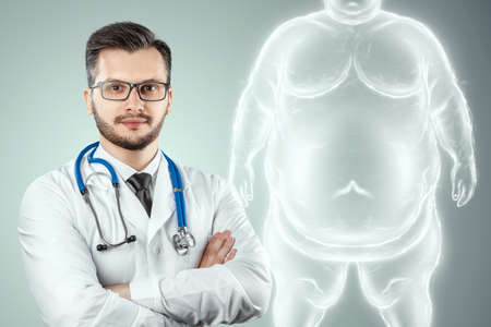 Blue horogram of a fat man on a black background isolate. 3D rendering, 3D illustrationの写真素材
