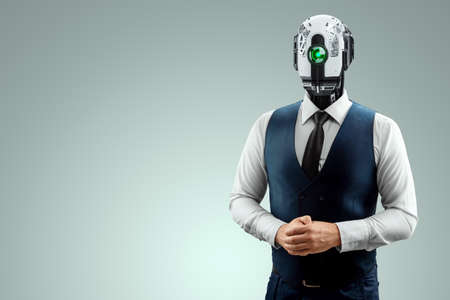 A man with a robot head, a cyborg. Robotics, new normal, future, technology. mixed mediaの写真素材