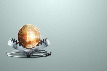 Bitcoin coin in a large metal bear trap, close-up. Soap bubble concept, crypto currency, blockchain, electronic money, virtual economy. 3D rendering, 3D illustrationの写真素材