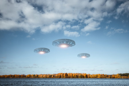UFO, an alien saucer hovering above the lake in the clouds, hovering motionless in the sky. Unidentified flying object, alien invasion, extraterrestrial life, space travel, spaceship. mixed media.の写真素材