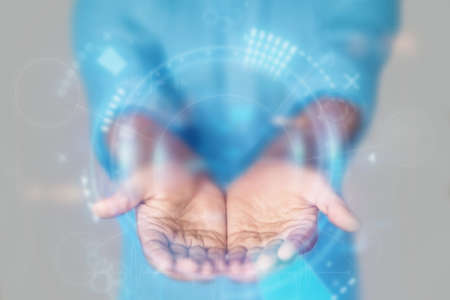Medical concept, doctor's hands in a blue coat close-up. Medical care, donation, first aid. mixed media.の写真素材