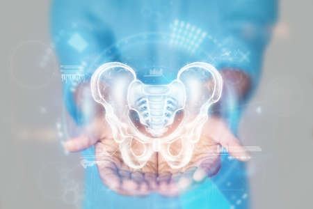 Medical concept, doctor's hands in a blue coat close-up. X-ray of the hip joint, ultrasound of the organs. Medical care, anatomy, doctor's appointment, medical technology. mixed media.の写真素材