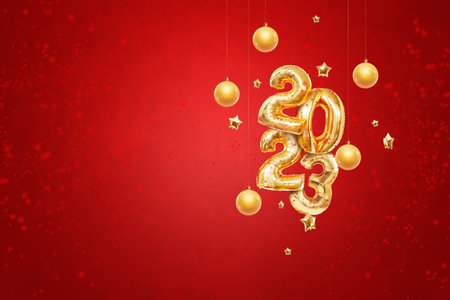 Happy new year 2023, golden inflatable balloons on a red background, confetti. Holiday card, magazine style, banner, website header, web poster, template for advertising. 3D illustration, 3D rendering.の写真素材