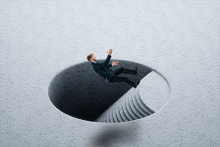 Stress, depression, emotional burnout. A lonely man falls into a black hole. Pessimism, loneliness, problems, unhappy person. Modern design, magazine styleの写真素材