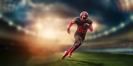 American Football player in red and black uniform in running pose against stadium background. American Football, advertising poster, template, blank, sports. 3D illustration, 3D renderingの写真素材