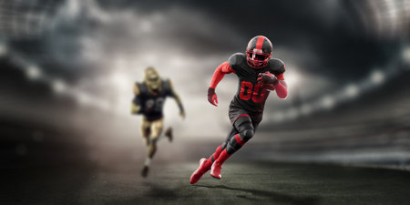 American Football player in red and black uniform in running pose against stadium background. American Football, advertising poster, template, blank, sports. 3D illustration, 3D renderingの写真素材