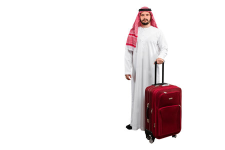Arab man with suitcase white background in traditional costume. Ready for cutting and editingの写真素材