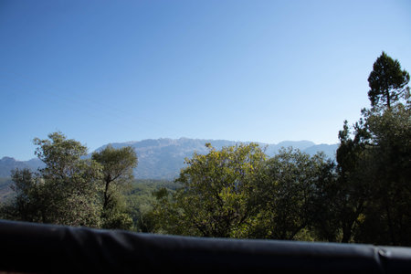 Beautiful views of the mountain nature. Mountains, forests, blue sky. The beauty of natureの写真素材