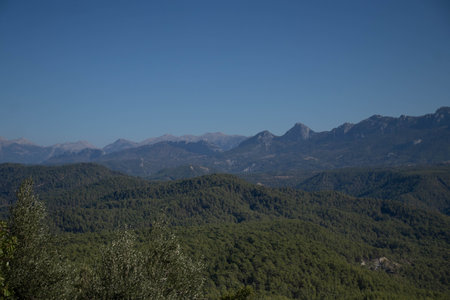Beautiful views of the mountain nature. Mountains, forests, blue sky. The beauty of natureの写真素材
