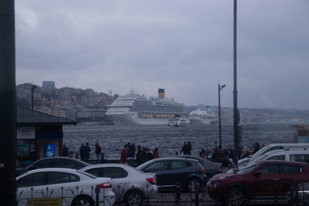 A large luxury cruise ship docked at the port of Istanbulの写真素材
