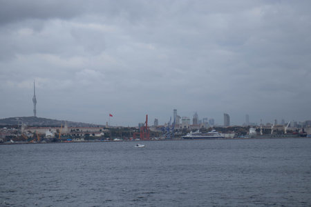 Boat trip on the Bosphorus, a beautiful view of the tourist attractions of Istanbul. Cityscape of Istanbul at sunsetの写真素材
