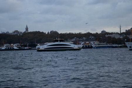 Boat trip along the Bosphorus. Tourists on a boat trip around Istanbulの写真素材