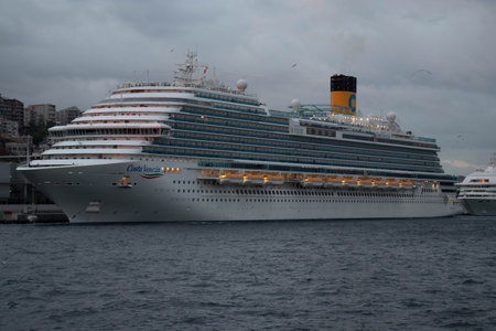 View of a large luxury cruise ship docked in Istanbul harborの写真素材