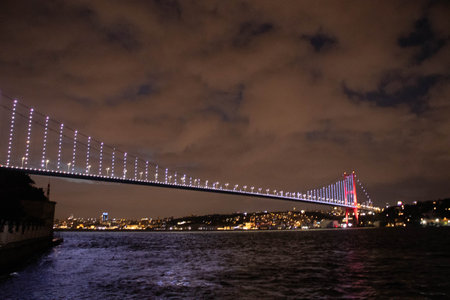 Night Istanbul. Beautiful view of the night Bosphorus bridge and the city. All on fire at sunsetの写真素材