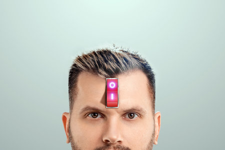 A businessman has a red switch in his head. The concept of turning on the power of the brain, turning off negative thoughts, turning on the thought process, generating ideasの写真素材