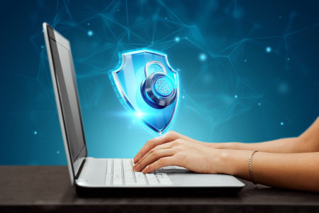Laptop, shield and lock with fingerprint hologram, fingerprint scanner. Data protection, cyber security, information security, data confidentiality, biometric password. Mixed mediaの写真素材